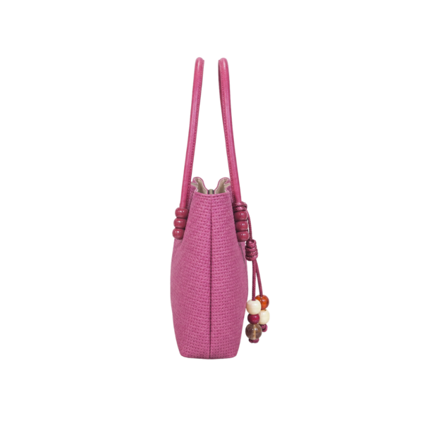 pink textured handbag for women by BAGCO front view