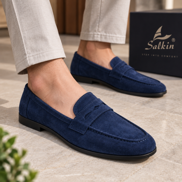 Men’s navy blue suede-look penny loafers with vamp strap detail
